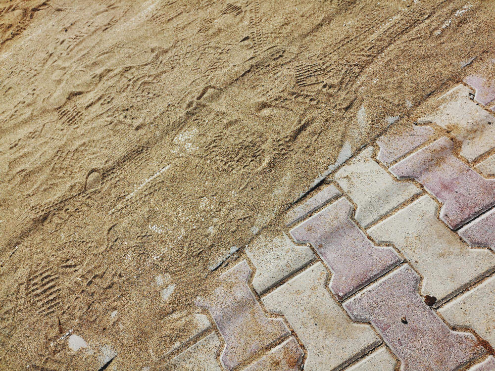 Sable sur pavés